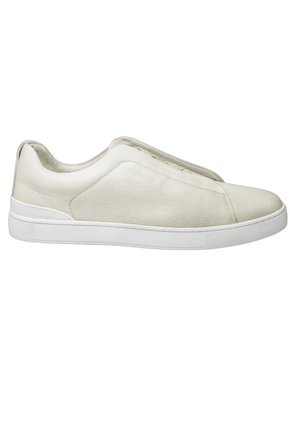 Enhance your casual footwear collection with these white leather slip-on sneakers, designed for comfort and style. Crafted from high-quality leather, these sneakers offer a sleek, modern aesthetic, making them versatile for a variety of outfits. The slip-on design ensures easy wear, while the cushioned insole offers all-day comfort. Perfect for a casual day or a quick run, these sneakers are an essential addition to your wardrobe.