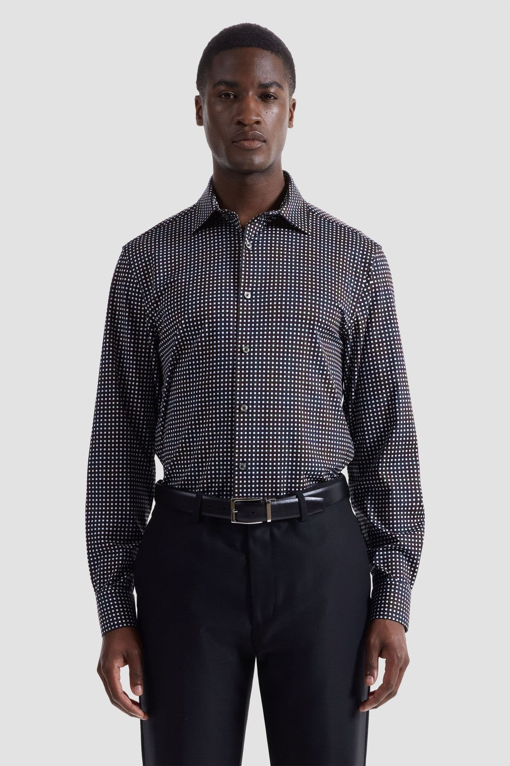 The James OoohCotton long-sleeved shirt in basketweave print features a point collar, mother-of-pearl buttons, and a curved hem for a sleek tucked or untucked look. The notched cuffs are adjustable to allow for customized fit and also convertible to accommodate cufflinks. OoohCotton® is a performance, double-mercerized, wrinkle-resistant, breathable, and easy-care cotton blend with 8-way stretch, quick-dry, and thermal comfort properties.