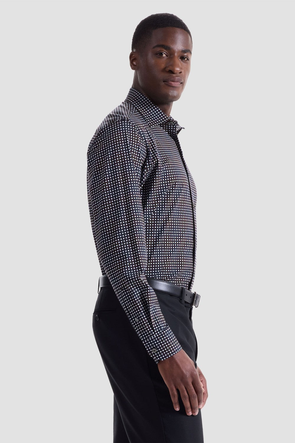 The James OoohCotton long-sleeved shirt in basketweave print features a point collar, mother-of-pearl buttons, and a curved hem for a sleek tucked or untucked look. The notched cuffs are adjustable to allow for customized fit and also convertible to accommodate cufflinks. OoohCotton® is a performance, double-mercerized, wrinkle-resistant, breathable, and easy-care cotton blend with 8-way stretch, quick-dry, and thermal comfort properties.