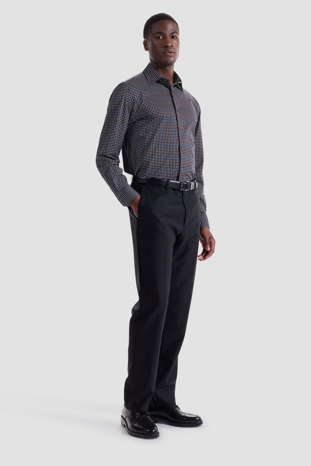 The James OoohCotton long-sleeved shirt in basketweave print features a point collar, mother-of-pearl buttons, and a curved hem for a sleek tucked or untucked look. The notched cuffs are adjustable to allow for customized fit and also convertible to accommodate cufflinks. OoohCotton® is a performance, double-mercerized, wrinkle-resistant, breathable, and easy-care cotton blend with 8-way stretch, quick-dry, and thermal comfort properties.