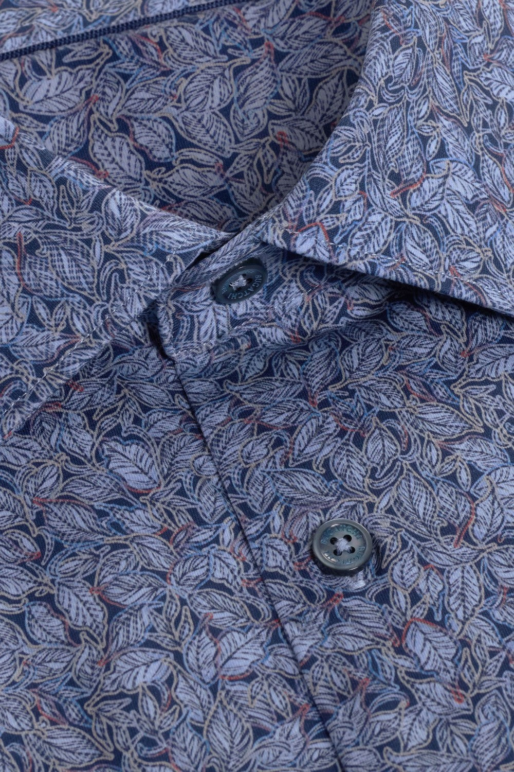 The James OoohCotton long-sleeved shirt in leaf print features a point collar, mother-of-pearl buttons, and a curved hem for a sleek tucked or untucked look. The notched cuffs are adjustable to allow for customized fit and also convertible to accommodate cufflinks. OoohCotton® is a performance, double-mercerized, wrinkle-resistant, breathable, and easy-care cotton blend with 8-way stretch, quick-dry, and thermal comfort properties.