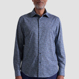 The James OoohCotton long-sleeved shirt in leaf print features a point collar, mother-of-pearl buttons, and a curved hem for a sleek tucked or untucked look. The notched cuffs are adjustable to allow for customized fit and also convertible to accommodate cufflinks. OoohCotton® is a performance, double-mercerized, wrinkle-resistant, breathable, and easy-care cotton blend with 8-way stretch, quick-dry, and thermal comfort properties.