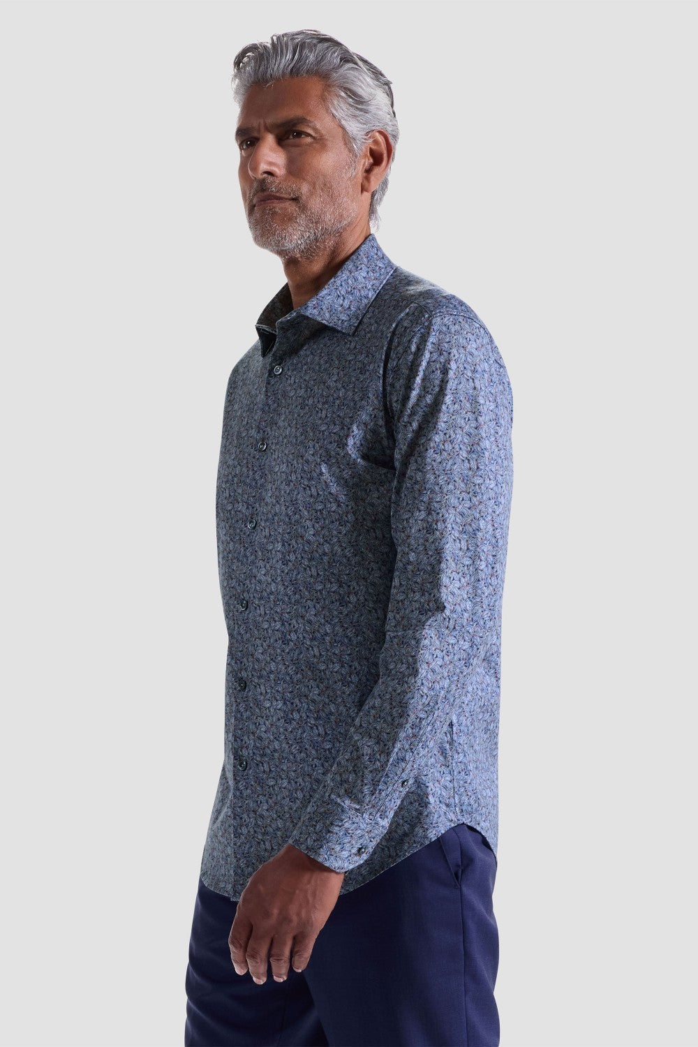 The James OoohCotton long-sleeved shirt in leaf print features a point collar, mother-of-pearl buttons, and a curved hem for a sleek tucked or untucked look. The notched cuffs are adjustable to allow for customized fit and also convertible to accommodate cufflinks. OoohCotton® is a performance, double-mercerized, wrinkle-resistant, breathable, and easy-care cotton blend with 8-way stretch, quick-dry, and thermal comfort properties.