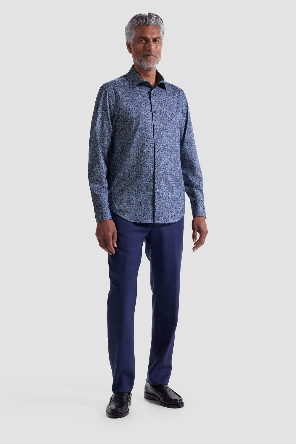 The James OoohCotton long-sleeved shirt in leaf print features a point collar, mother-of-pearl buttons, and a curved hem for a sleek tucked or untucked look. The notched cuffs are adjustable to allow for customized fit and also convertible to accommodate cufflinks. OoohCotton® is a performance, double-mercerized, wrinkle-resistant, breathable, and easy-care cotton blend with 8-way stretch, quick-dry, and thermal comfort properties.