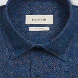 The James OoohCotton long-sleeved shirt in marbled print features a point collar and a curved hem for a sleek tucked or untucked look. The notched cuffs are adjustable to allow for customized fit and also convertible to accommodate cufflinks. OoohCotton® is a performance, double-mercerized, wrinkle-resistant, breathable, and easy-care cotton blend with 8-way stretch, quick-dry, and thermal comfort properties.