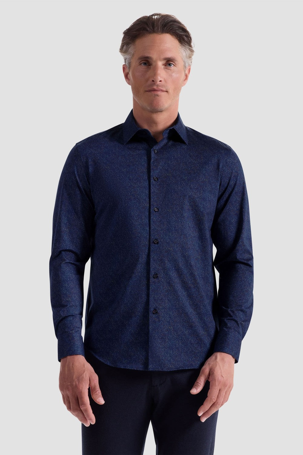 The James OoohCotton long-sleeved shirt in marbled print features a point collar and a curved hem for a sleek tucked or untucked look. The notched cuffs are adjustable to allow for customized fit and also convertible to accommodate cufflinks. OoohCotton® is a performance, double-mercerized, wrinkle-resistant, breathable, and easy-care cotton blend with 8-way stretch, quick-dry, and thermal comfort properties.