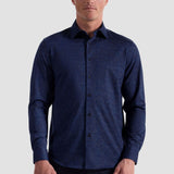 The James OoohCotton long-sleeved shirt in marbled print features a point collar and a curved hem for a sleek tucked or untucked look. The notched cuffs are adjustable to allow for customized fit and also convertible to accommodate cufflinks. OoohCotton® is a performance, double-mercerized, wrinkle-resistant, breathable, and easy-care cotton blend with 8-way stretch, quick-dry, and thermal comfort properties.