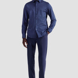 The Jules OoohCotton long-sleeved shirt in geometric print features a hidden button-down collar, mother-of-pearl buttons, and a curved hem for a sleek tucked or untucked look. The notched cuffs are adjustable to allow for customized fit and also convertible to accommodate cufflinks. OoohCotton® is a performance, double-mercerized, wrinkle-resistant, breathable, and easy-care cotton blend with 8-way stretch, quick-dry, and thermal comfort properties.