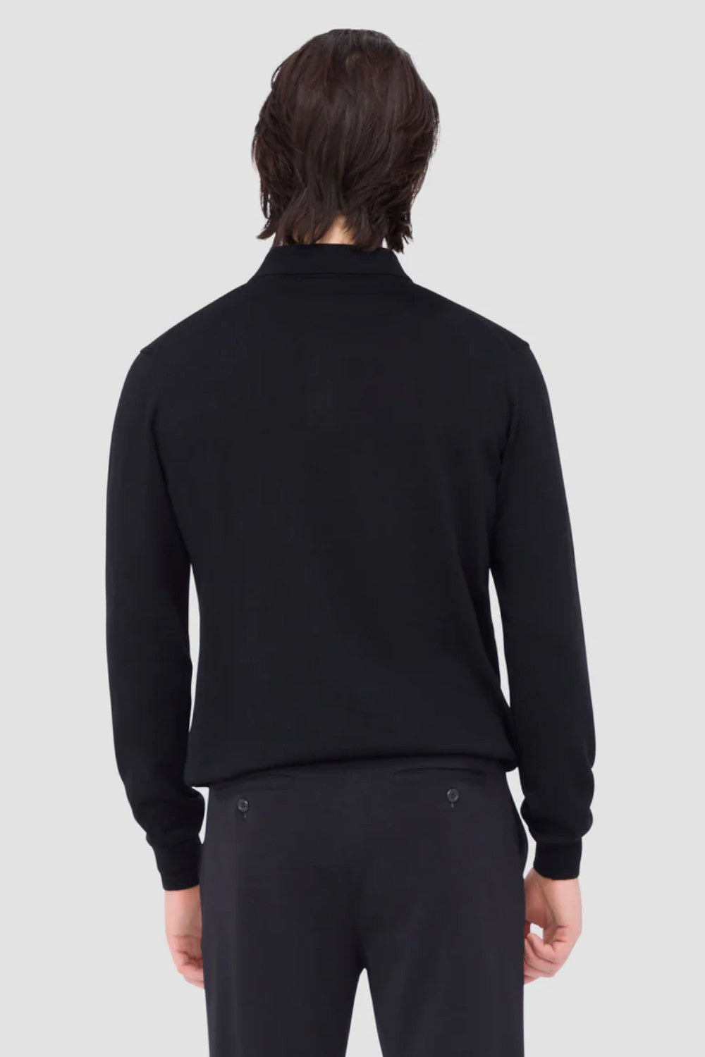 This timeless polo sweater in 100% extra fine merino wool with Harmony 4.0 special finish is made in Italy and features a classic three button placket and ribbed cuffs, and waistband. Unequalled in softness and comfort, it is made with a high twist yarn that is breathable, hygroscopic, water-repellent, machine washable, and crease-proof, ensuring long-lasting performance wash after wash.