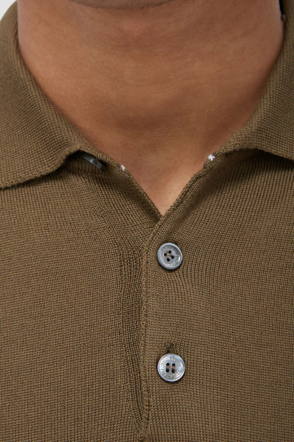 This timeless polo sweater in 100% extra fine merino wool with Harmony 4.0 special finish is made in Italy and features a classic three button placket and ribbed cuffs, and waistband. Unequalled in softness and comfort, it is made with a high twist yarn that is breathable, hygroscopic, water-repellent, machine washable, and crease-proof, ensuring long-lasting performance wash after wash.