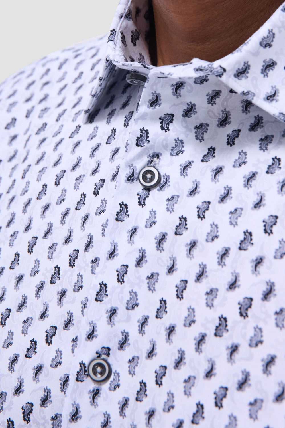 The Miles OoohCotton short-sleeve shirt in toucan print features a point collar, mother-of-pearl buttons, and a curved hem for a sleek tucked or untucked look. OoohCotton is a performance, double-mercerized, wrinkle-resistant, breathable, and easy-care cotton blend with 8-way stretch, quick-dry, and thermal comfort properties.