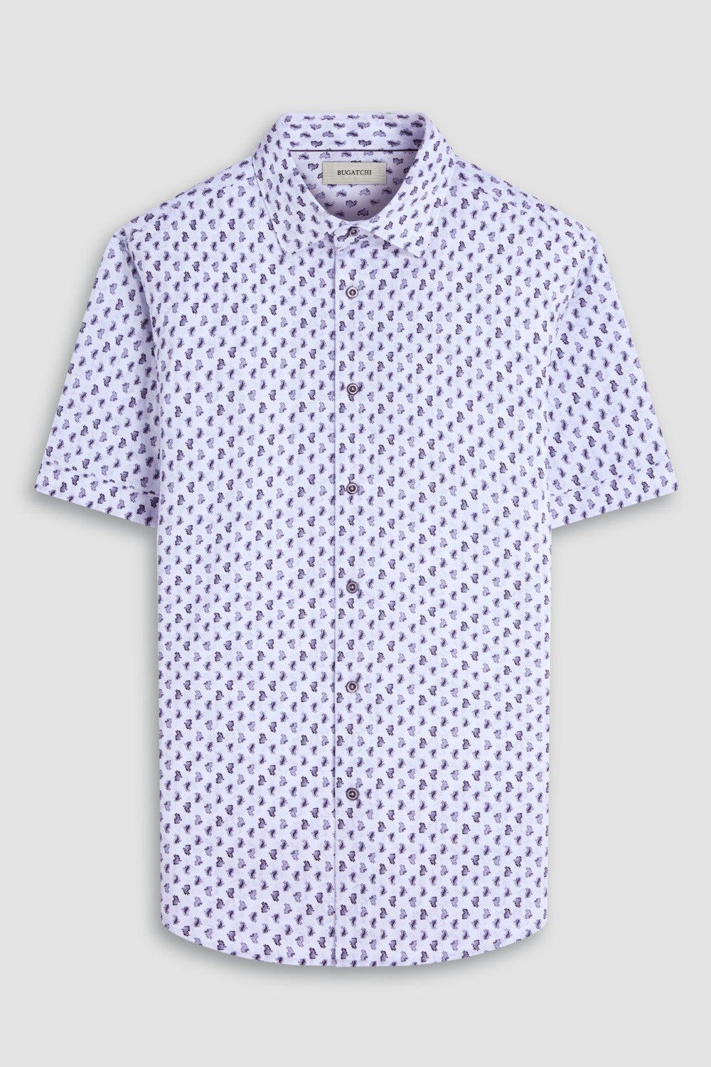The Miles OoohCotton short-sleeve shirt in toucan print features a point collar, mother-of-pearl buttons, and a curved hem for a sleek tucked or untucked look. OoohCotton is a performance, double-mercerized, wrinkle-resistant, breathable, and easy-care cotton blend with 8-way stretch, quick-dry, and thermal comfort properties.