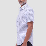 The Miles OoohCotton short-sleeve shirt in toucan print features a point collar, mother-of-pearl buttons, and a curved hem for a sleek tucked or untucked look. OoohCotton is a performance, double-mercerized, wrinkle-resistant, breathable, and easy-care cotton blend with 8-way stretch, quick-dry, and thermal comfort properties.