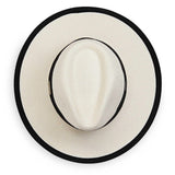 Light hat with black rim on a white background