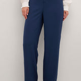 The Cream Cocamia Pant is a versatile and stylish addition to any wardrobe. With its blue colour, this pant offers a sleek and sophisticated look. The zip and button closure, along with the elastic back waist, provide a comfortable fit for all-day wear. Complete with pockets and belt loops, this pant offers both style and functionality.