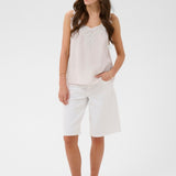 A basic wardrobe essential with an elevated look! The Cream Anna Top is a cami you’re sure to love