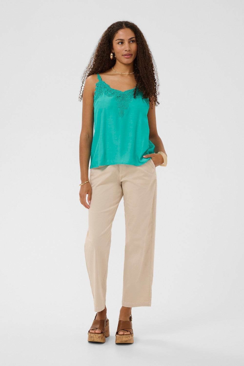 A basic wardrobe essential with an elevated look! The Cream Anna Top is a cami you’re sure to love 