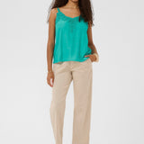 A basic wardrobe essential with an elevated look! The Cream Anna Top is a cami you’re sure to love 
