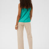 A basic wardrobe essential with an elevated look! The Cream Anna Top is a cami you’re sure to love 