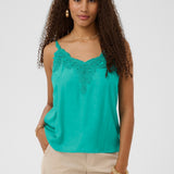 A basic wardrobe essential with an elevated look! The Cream Anna Top is a cami you’re sure to love 