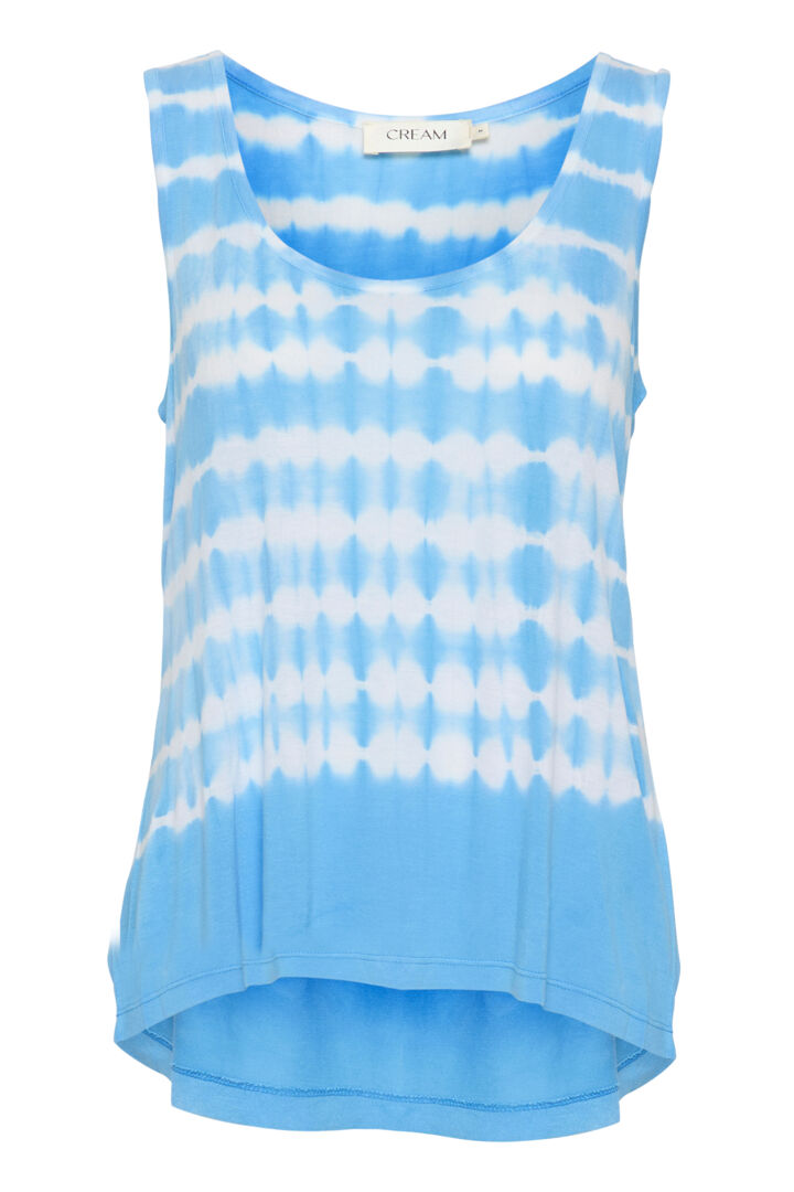 Embrace the summer vibes with our Cream Bastilla Top! This fresh blue and white tie dye sleeveless top will bring some fun to your wardrobe. Perfect for those who don't take themselves too seriously.