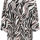 Zebra patterned shirt on a white background