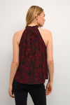 Crafted from 100% Viscose for a silky feel, this poppin' poppy red top will have you purring with style.