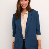 The Cream Cocamia Blazer is a versatile addition to any wardrobe. Its dress blues colour exudes elegance, while the 3/4 sleeves and functional pockets provide both practicality and style. With its one button closure and fully lined interior, this blazer is perfect for any occasion.