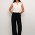The Cream Cocamia Pant is a versatile and stylish addition to any wardrobe. With its pitch black colour, this pant offers a sleek and sophisticated look. The zip and button closure, along with the elastic back waist, provide a comfortable fit for all-day wear. Complete with pockets and belt loops, this pant offers both style and functionality.