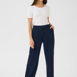 The Cream Cocamia Pant is a versatile and stylish addition to any wardrobe. This pant offers a sleek and sophisticated look, and the zip and button closure, along with the elastic back waist, provide a comfortable fit for all-day wear. Complete with pockets and belt loops, this pant offers both style and functionality.