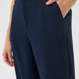 The Cream Cocamia Pant is a versatile and stylish addition to any wardrobe. This pant offers a sleek and sophisticated look, and the zip and button closure, along with the elastic back waist, provide a comfortable fit for all-day wear. Complete with pockets and belt loops, this pant offers both style and functionality.