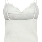 White lace camisole on a white background