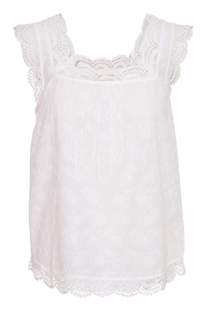 The Cream Emma Top is a romantic and stylish addition to any wardrobe. Made with 100% cotton, it features a sleeveless design and a flattering square neckline. The delicate embroidery and lace add a touch of elegance to this versatile piece.