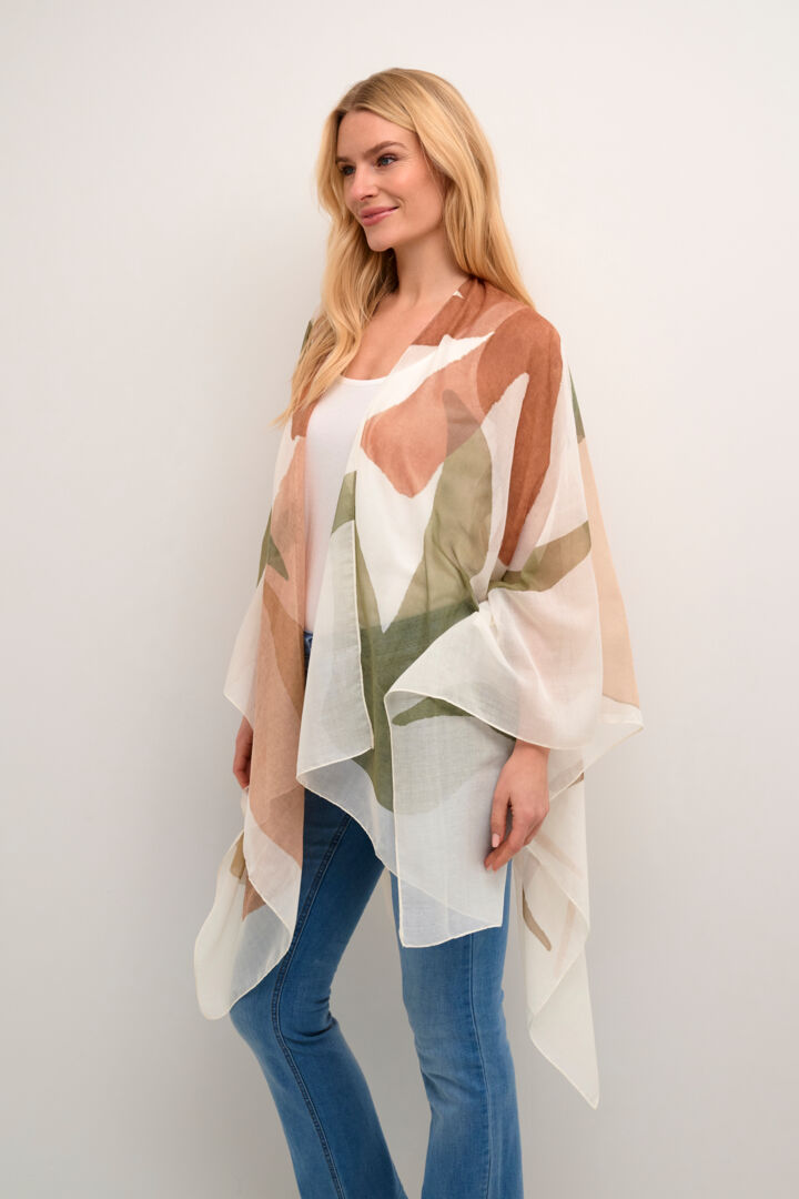 Take your summer style to the next level with our Cream Enna Poncho. Made from lightweight fabric, this sheer poncho features a playful palm print, perfect for adding a touch of pizzazz to any outfit. Stay stylish while beating the heat in this unique and fun piece!