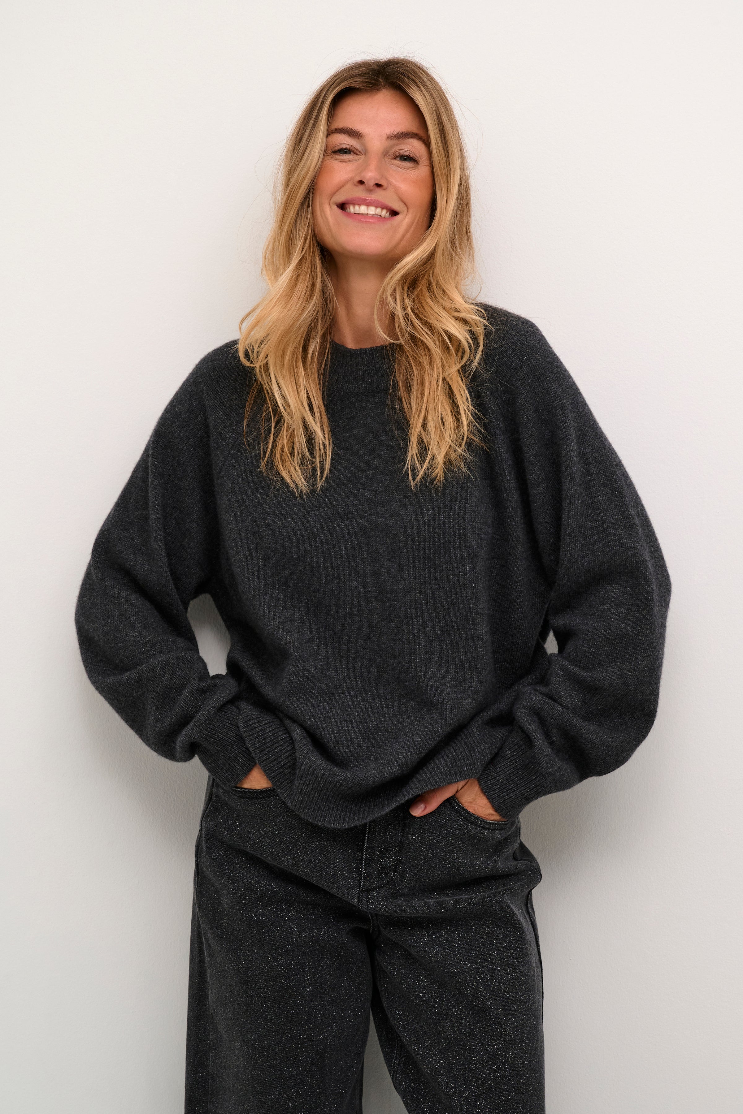 This Cream Ever Knit Pullover is crafted from a luxurious wool cashmere blend, providing both warmth and comfort. Its easy-to-wear design makes it a versatile and effortless addition to any wardrobe. Stay cozy and stylish with this essential piece.