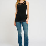 The Cream Florence Top is a stylish and versatile addition to any wardrobe. This pitch black tank top features a delicate lace trim, adding a touch of femininity to a classic design. Made with high-quality materials, it offers both comfort and fashion in one piece. Perfect for any occasion, this long tank top is a must-have for the modern woman.