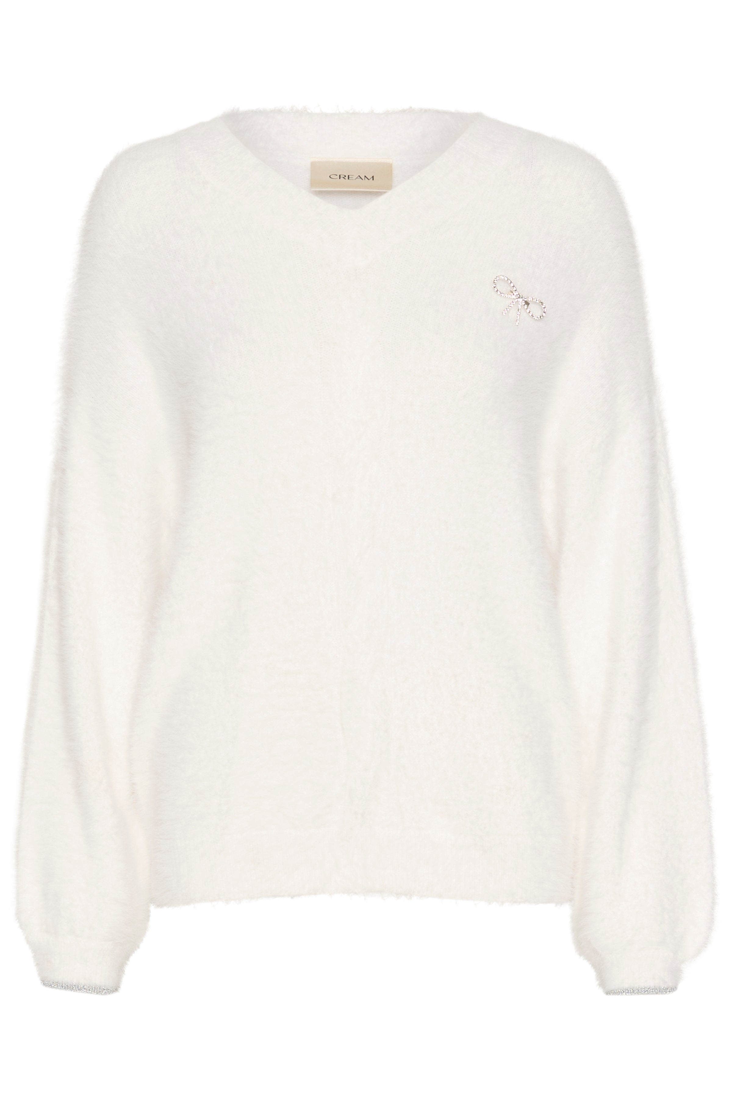 Experience ultimate comfort and style with our Cream Frosty Knit Pullover. Crafted from a soft, cosy fabric, this pullover will keep you warm and comfortable all day long. The adorable removable pin add a touch of elegance to this versatile piece. Perfect for any occasion, it's a must-have addition to your wardrobe.