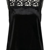 Black sleeveless top with lace detailing on a white background
