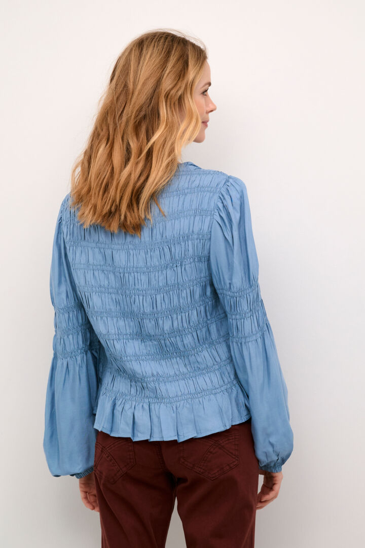 Introducing the Cream Henva Blouse, a stylish addition to your wardrobe. With a beautiful captain's blue colour, this blouse is the perfect way to elevate your denim look. Expertly crafted for a flattering fit, it's the ideal choice for almost any occasion. Elevate your style with this must-have blouse.