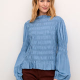 Introducing the Cream Henva Blouse, a stylish addition to your wardrobe. With a beautiful captain's blue colour, this blouse is the perfect way to elevate your denim look. Expertly crafted for a flattering fit, it's the ideal choice for almost any occasion. Elevate your style with this must-have blouse.