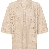 Beige lace jacket on a white background