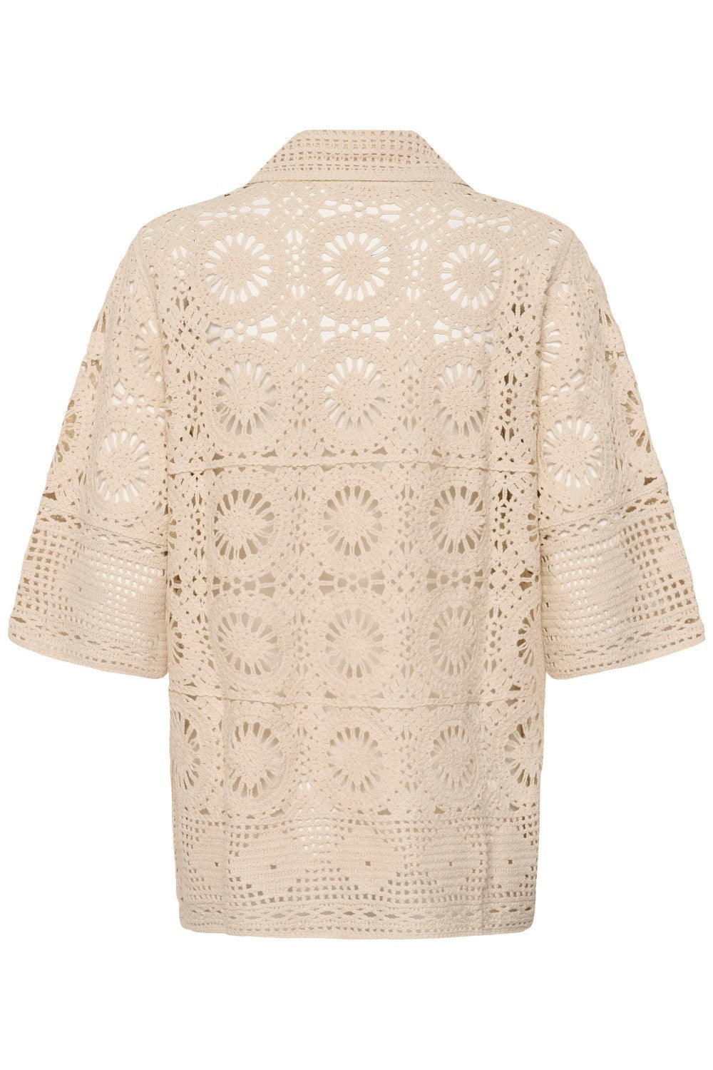 Beige crochet top on a white background