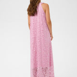 Woman wearing a pink dress on a white background