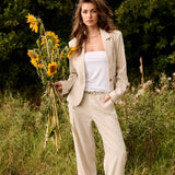 The Cream June Pant is your summer wardrobe essential. This lightweight linen blend dress pant offers breathable comfort without sacrificing polish. Designed to move with you through warm months while maintaining a refined, put-together look.