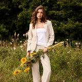 The Cream June Pant is your summer wardrobe essential. This lightweight linen blend dress pant offers breathable comfort without sacrificing polish. Designed to move with you through warm months while maintaining a refined, put-together look.