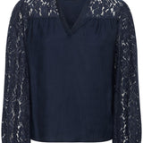 Navy blouse with lace shoulders and sleeves on white background