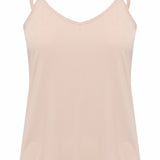 The Cream Lissandra Sliptop is an essential everyday cami designed for versatile layering. This sophisticated piece provides extra coverage beneath sheer tops while maintaining a sleek silhouette. The neutral tone ensures seamless integration with your existing wardrobe, making it an indispensable foundation garment for creating polished, layered ensembles.