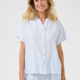 Effortlessly elevate your wardrobe with our Cream Lori Lace Shirt. This lightweight, full button front shirt makes for an easy and stylish addition to any outfit. The subtle lace detailing adds a touch of elegance, perfect for most occasions.