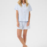 Effortlessly elevate your wardrobe with our Cream Lori Lace Shirt. This lightweight, full button front shirt makes for an easy and stylish addition to any outfit. The subtle lace detailing adds a touch of elegance, perfect for most occasions.