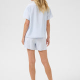 Effortlessly elevate your wardrobe with our Cream Lori Lace Shirt. This lightweight, full button front shirt makes for an easy and stylish addition to any outfit. The subtle lace detailing adds a touch of elegance, perfect for most occasions.